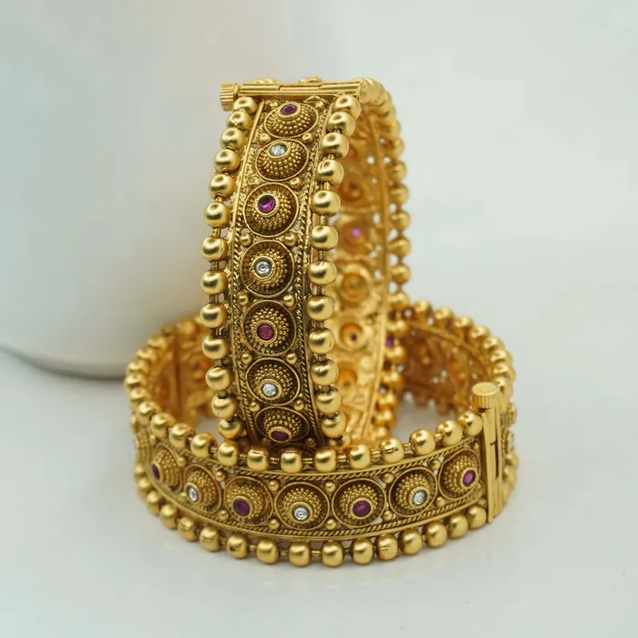 Beautiful and uniquely designed  gold plated copper bangles