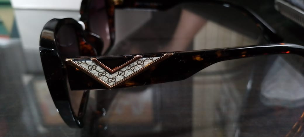 Cat-eye sunglasses with photochromic lens -  Gucci