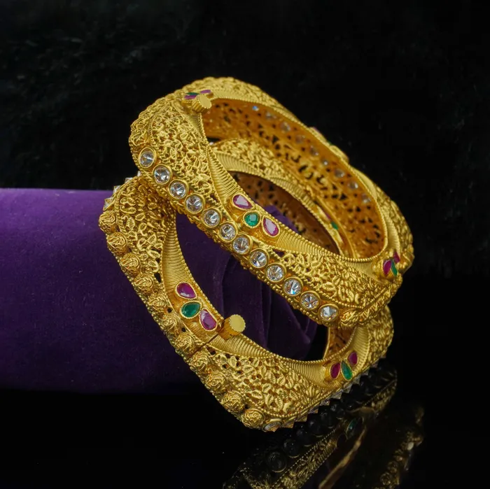 Beautiful uniquely designed gold plated copper bangles