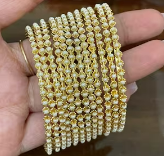 Beautiful and uniquely white stone jhumki studded bangles