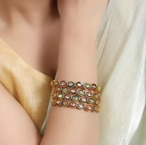 New gold polish kundan studded copper Bangle set