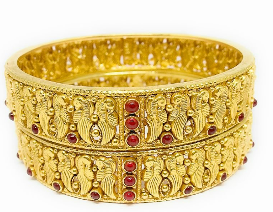 Beautiful and uniquely gold plated stone studded bangle