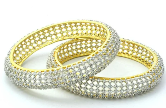 Beautiful and uniquely gold plated moti & AD studded bangle