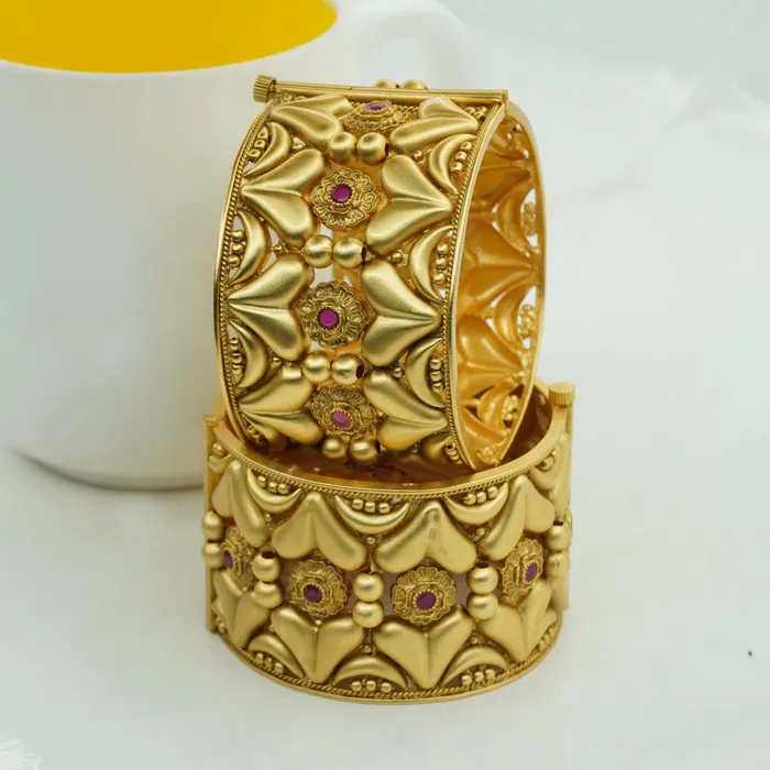 Handcrafted gold plated Traditional copper design bangle set