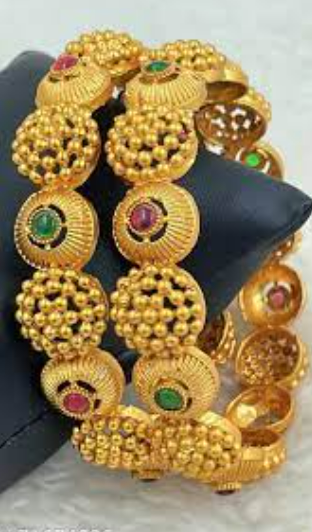 Beautiful and uniquely gold plated stone studded bangles
