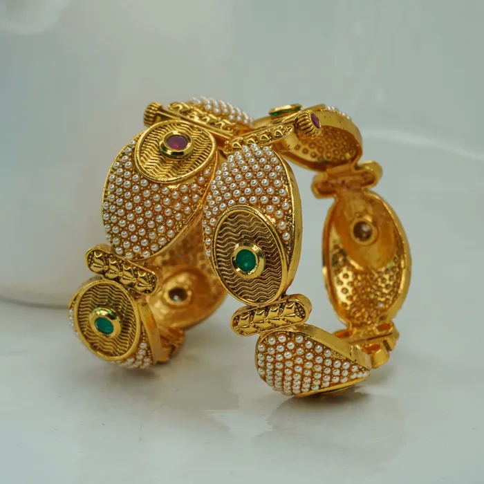 Beautiful and uniquely designed gold plated copper bangles